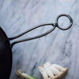 Hand Hammered Classic Wok with a metal handle that stays cool while cooking