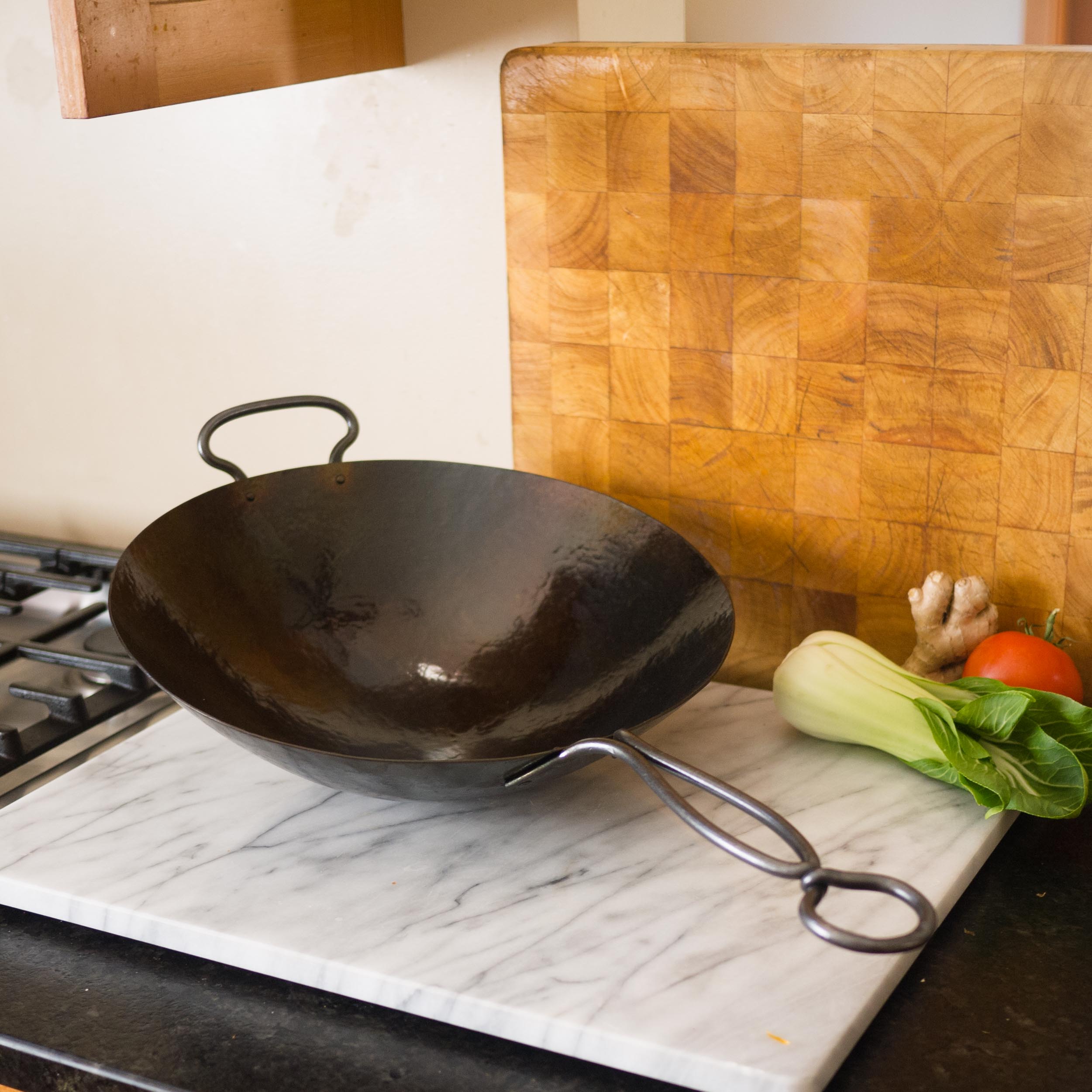 newquistforge Woks and Pans Hand Hammered Wok • Metal handle stays cool while cooking!